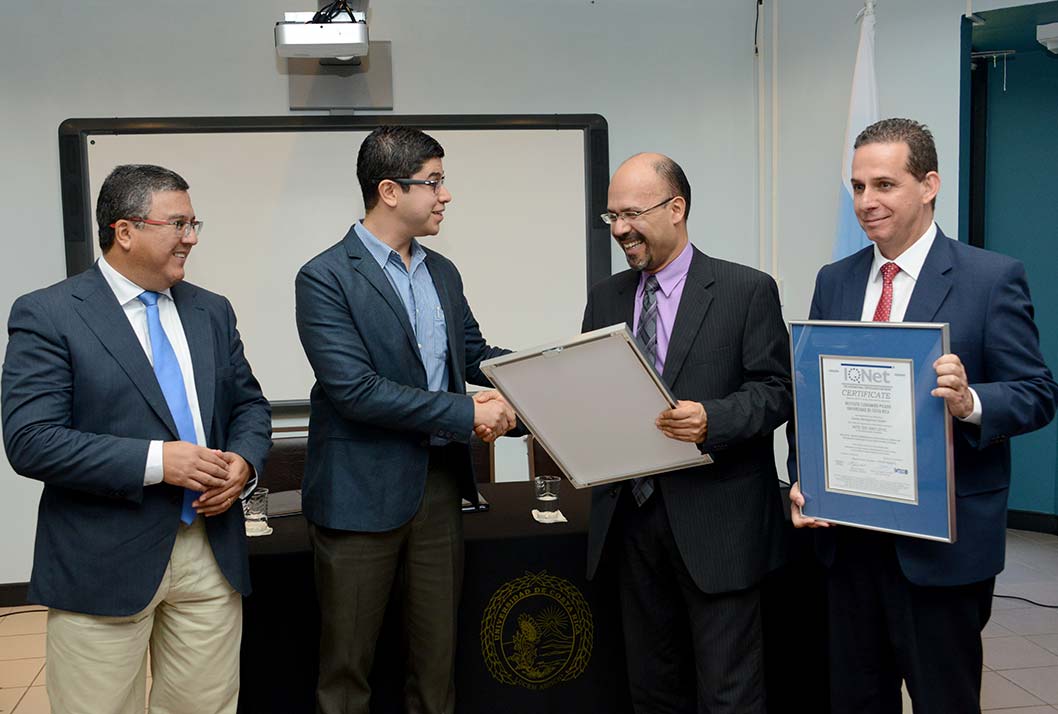 From right to left, research vice rector Dr. Fernando García Santamaría, and ICP director Dr. Alberto Alape Girón, receive the INTECO and IQNet quality management certificates from the hands of Eng. Andrés Ramírez Carranza. They are joined by the administration vice rector, Dr. Carlos Araya Leandro. - photo by Laura Rodríguez Rodríguez.