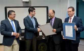 From right to left, research vice rector Dr. Fernando García Santamaría, and ICP director Dr. Alberto Alape Girón, receive the INTECO and IQNet quality management certificates from the hands of Eng. Andrés Ramírez Carranza. They are joined by the administration vice rector, Dr. Carlos Araya Leandro. - photo by Laura Rodríguez Rodríguez.